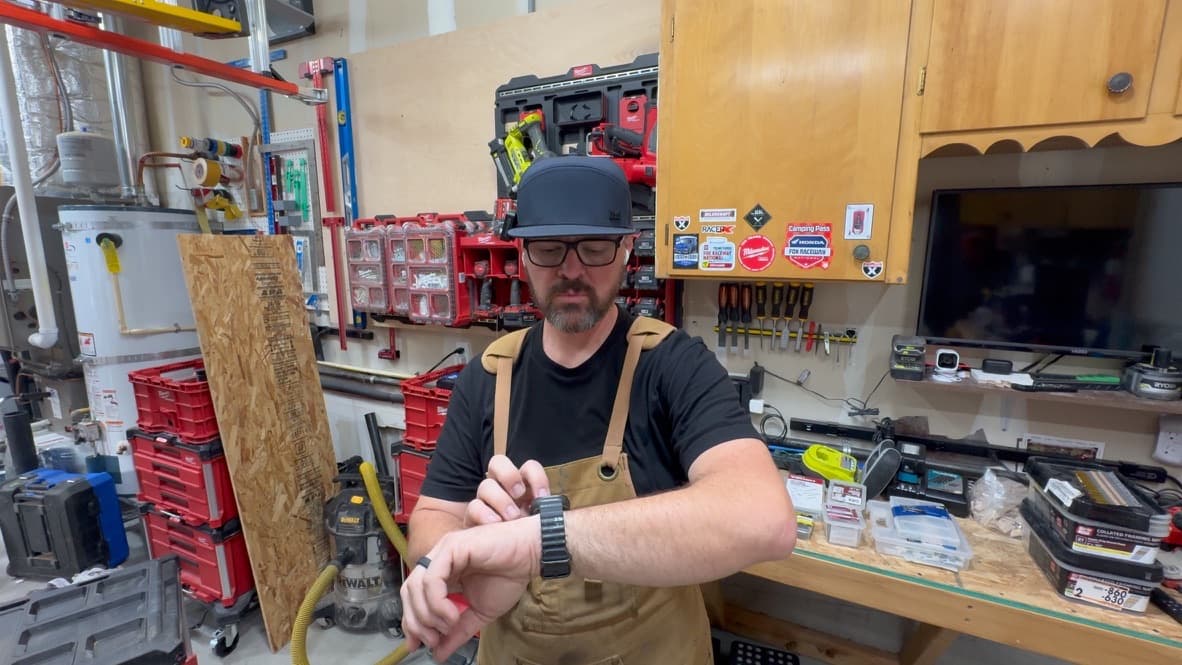 Brandon Carroll in his workshop, surrounded by tools